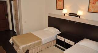 Гостиница Приморье Владивосток Стандартный двухместный номер с 2 отдельными кроватями (STT)-5